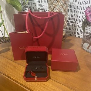 Cartier “love” earrings:white gold